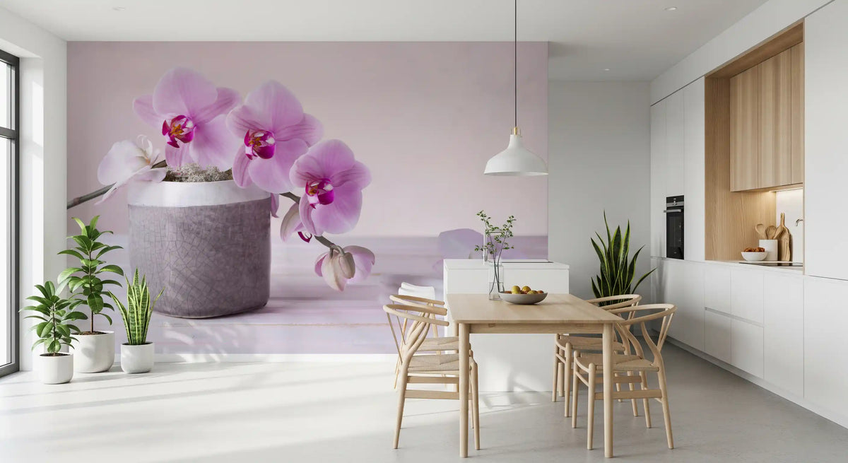 Floral wallpaper in a kitchen dining area with white cabinets and a light wood table GD13139