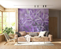 Violet allium wall mural above a tan leather sofa and woven lounge chair GD13140