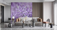 Soft violet allium mural behind a gray sofa next to a wood slat panel GD13140