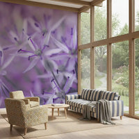 Floral wallpaper in a sunroom with a striped sofa and garden view windows GD13140