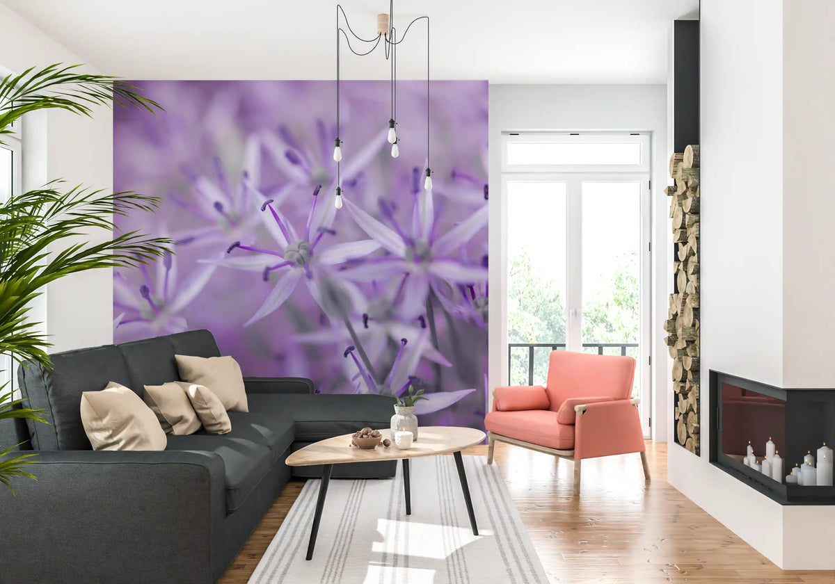 Lilac allium wall mural behind a charcoal sectional and coral armchair GD13140