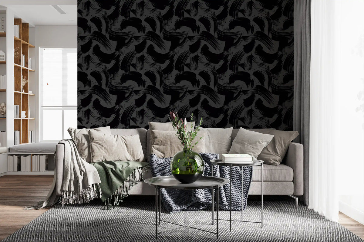 Living room with beige sofa, black side tables and knit throws on brushstroke wallpaper GD13313