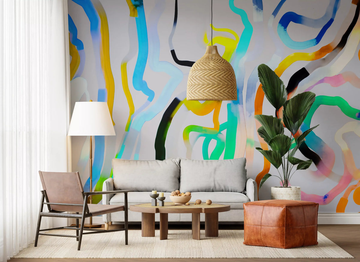 Living room with wicker pendant, leather chair and cognac pouf on brush stroke wallpaper GD13326
