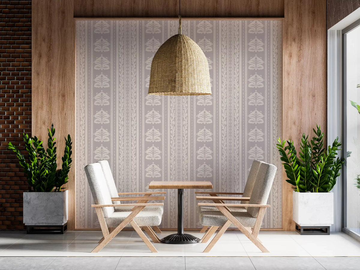 Vintage wallpaper in lilac gray behind small dining table with woven pendant GD13366