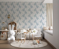 Ethereal Winged Horses on Soft Blue Wallpaper⁠