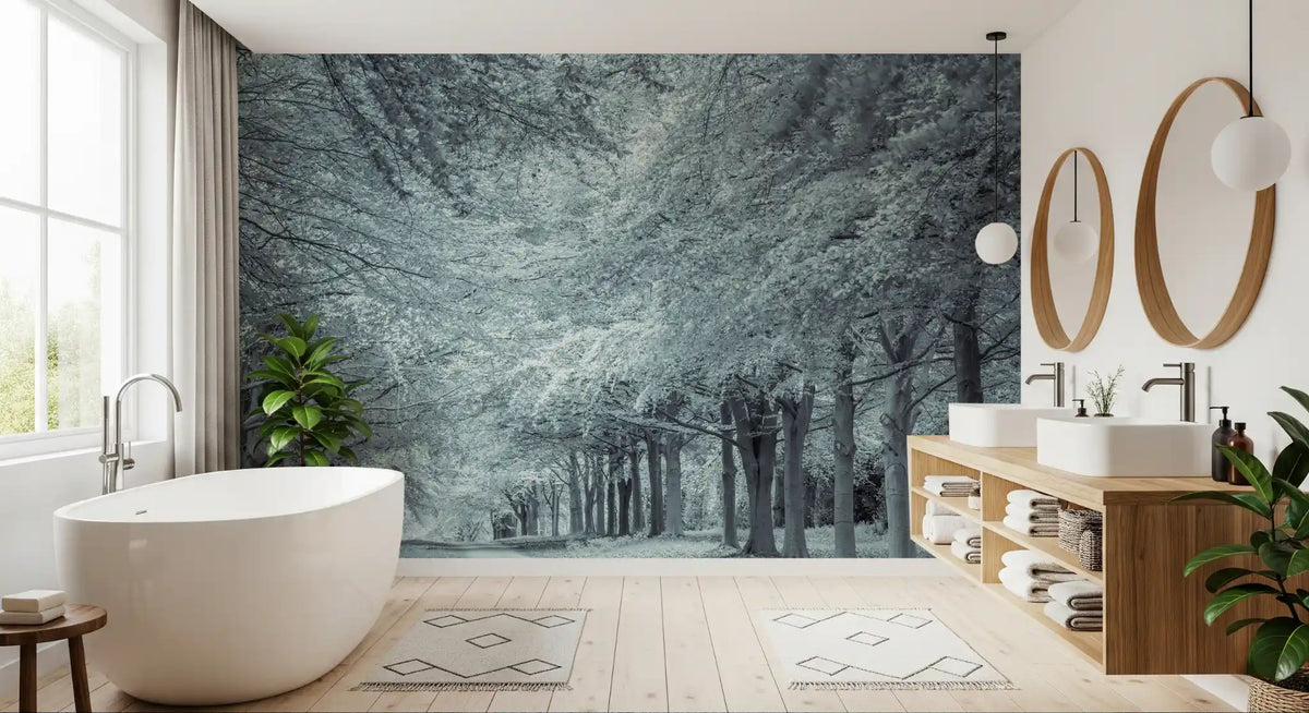 Forest wallpaper mural in a bathroom with a freestanding tub and wood twin vanity GD13401