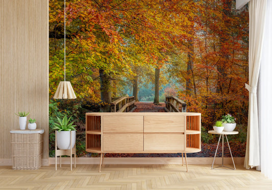 Forest wallpaper mural behind light oak sideboard with potted plants and pendant lamp GD13406