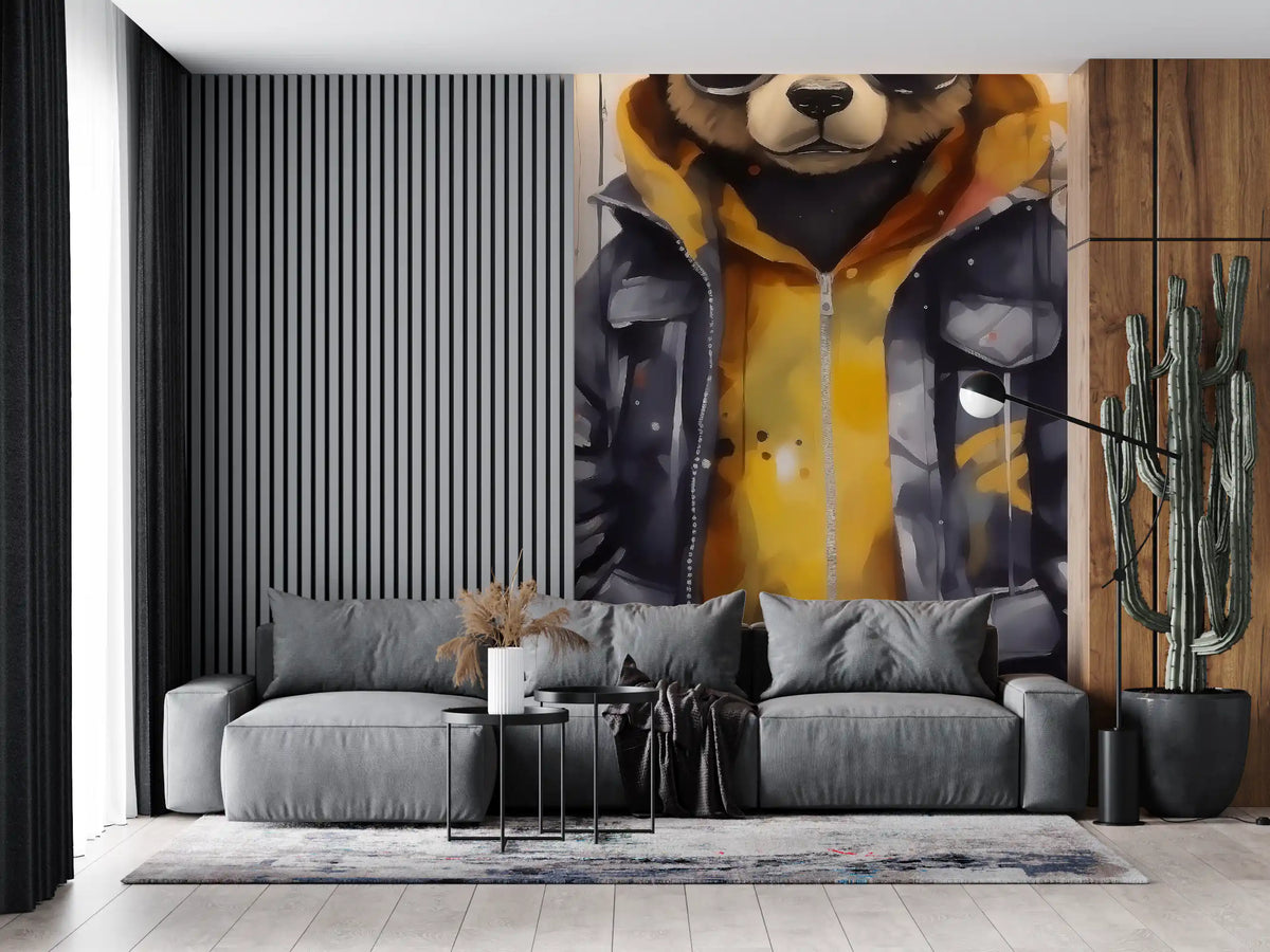 Bear wallpaper mural of a cool bear in a hoodie behind a gray sofa beside a slatted wall and cactus GD13449