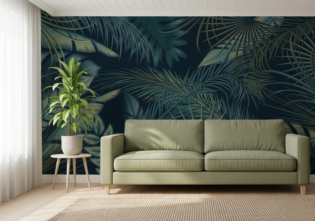 Tropical wallpaper behind a sage green sofa and a potted plant on a stool GD13455