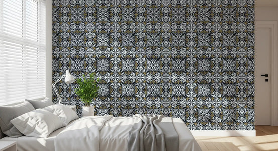 Bedroom with white bedding and desk lamp beside charcoal arabesque damask wallpaper GD13523