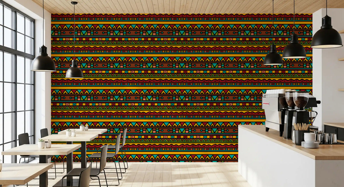 Cafe kitchen with coffee machine and black pendants against bright tribal wallpaper GD13602