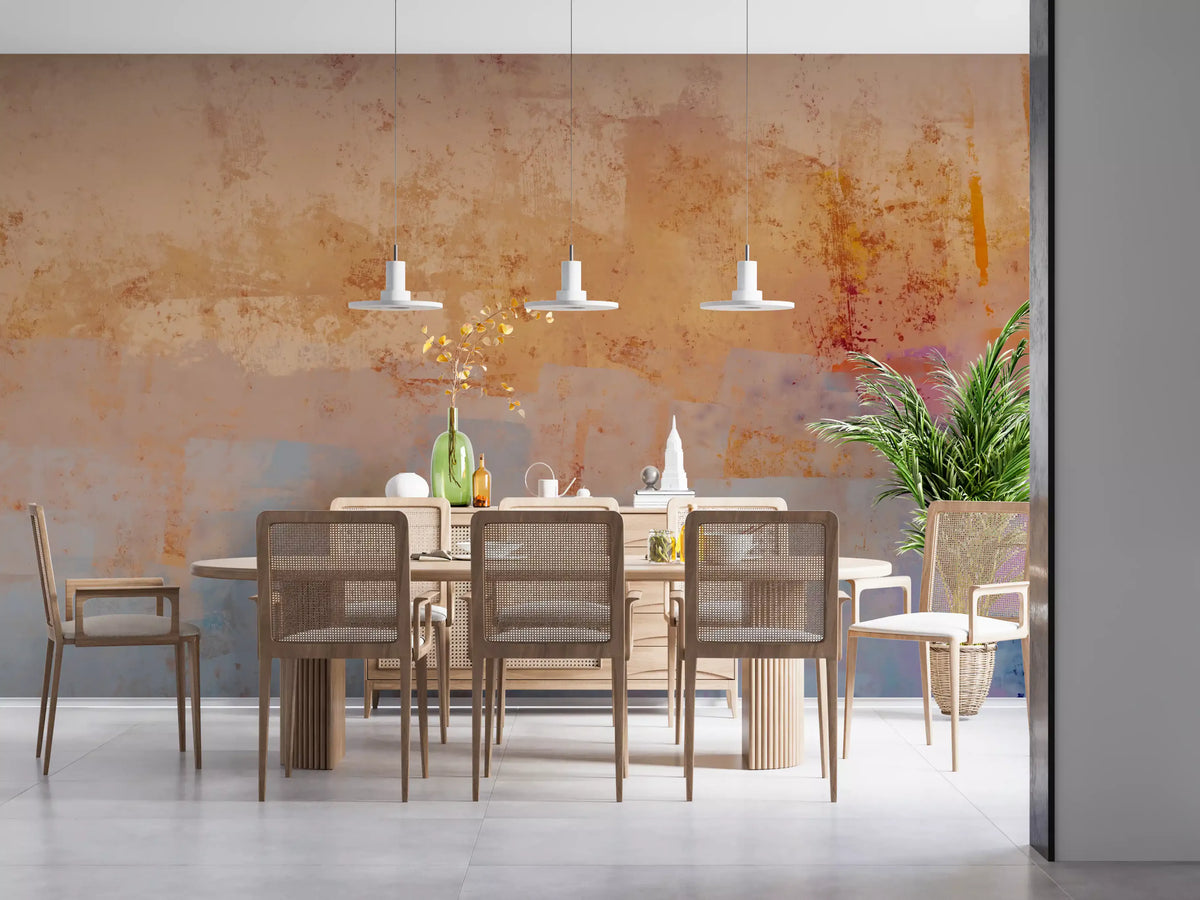 Dining room with wood table, cane chairs and white pendants on peach brushstroke wallpaper GD13756