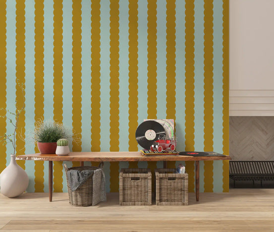 Striped wallpaper behind a wood console with record player, wicker baskets and potted plants GD13776