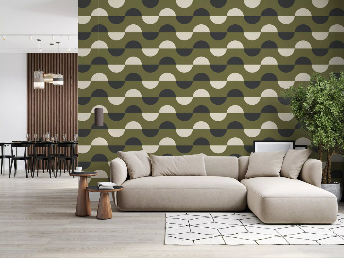 Geometric wallpaper behind a beige sectional sofa with a dining area beyond GD13941