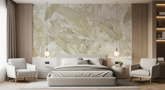Beige botanical wallpaper mural behind a gray upholstered bed and two cream armchairs in a calm bedroom GD13954