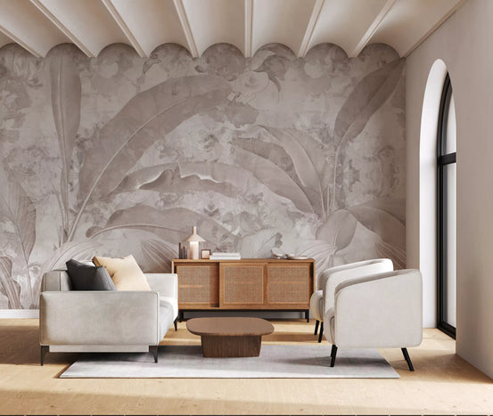 Mauve botanical wallpaper behind white armchairs and a rattan sideboard under a scalloped ceiling GD13964