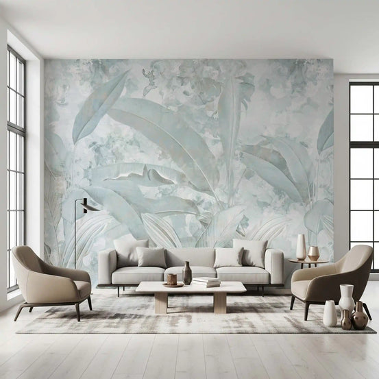 Living room with gray sofa and two taupe armchairs on ice blue banana leaf wallpaper GD13974