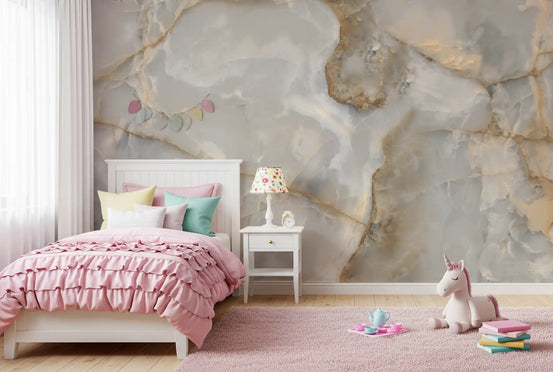 Girls bedroom with pink ruffled bed, unicorn toy and pink rug on gray onyx marble wallpaper GD13986