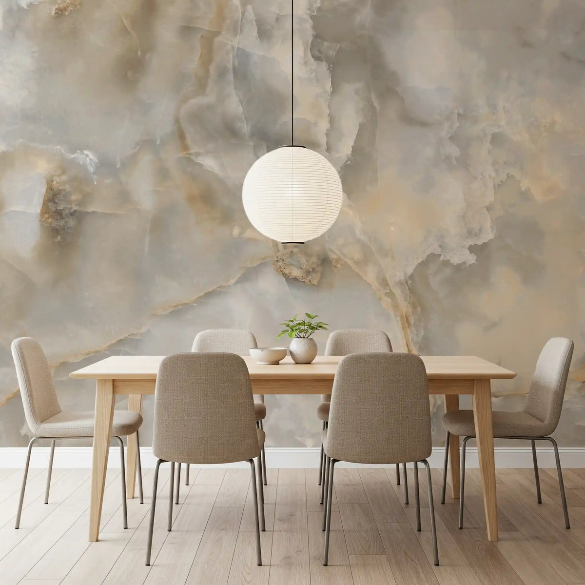 Dining room with oak table, beige chairs and paper globe pendant on cream marble wallpaper GD13988