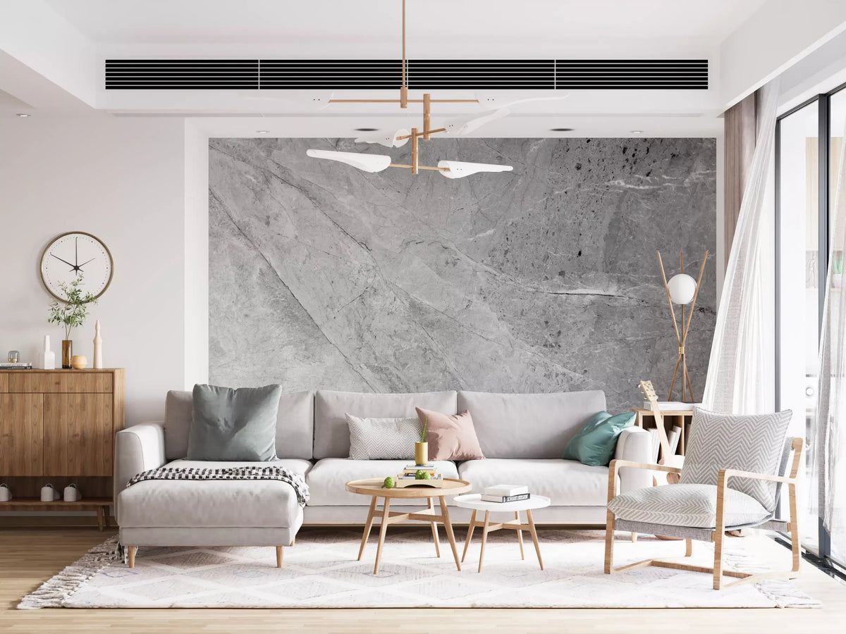 Living room with gray sofa, round wood tables and gold chandelier on gray marble wallpaper GD14033