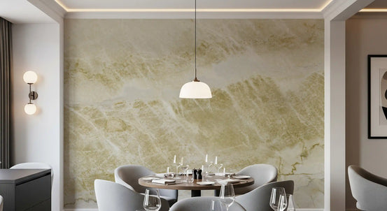 Dining room with round table, gray chairs and white pendant on golden vein marble mural GD14056