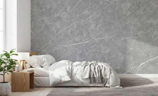 Gray marble wallpaper mural behind white bed with knit throw and wood nightstand GD14084