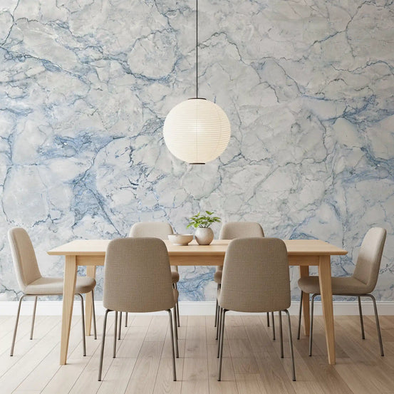 Dining room with wood table, taupe chairs and paper globe pendant on blue marble wallpaper GD14099