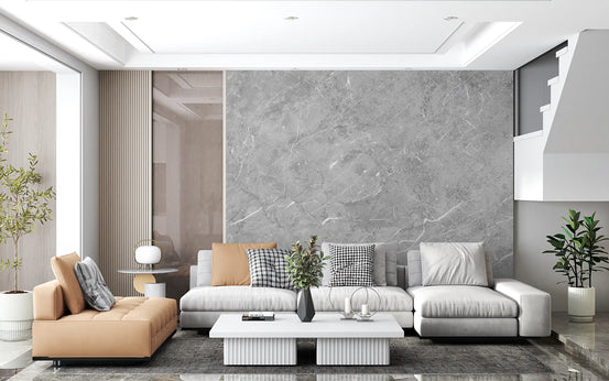 White sectional and tan leather armchair in front of gray stone marble wallpaper GD14101