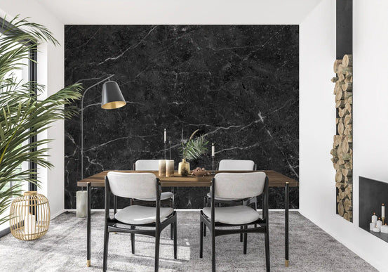 Charcoal marble wallpaper behind a wood dining table and white padded chairs GD14104