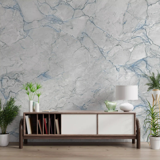 Walnut and white media console with table lamp and plants on marble wallpaper mural GD14161