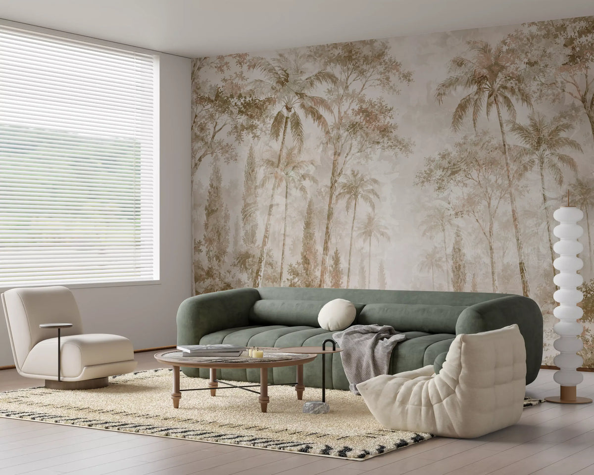 Jungle wallpaper behind a green velvet sofa and cream lounge chair GD14184