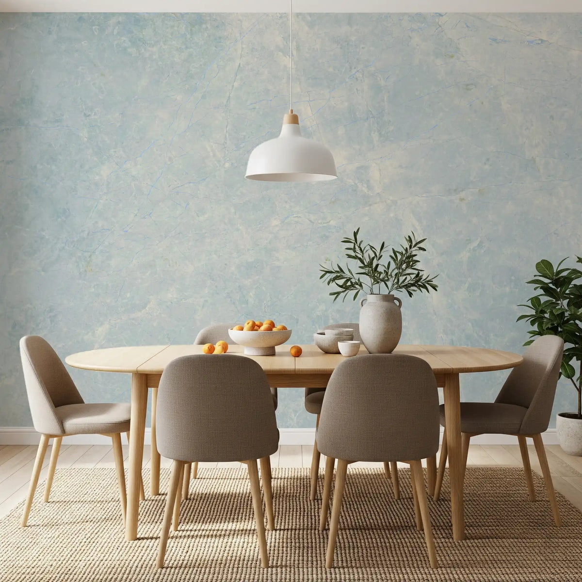 Round oak dining table with taupe chairs and white pendant on azure marble wallpaper GD14187