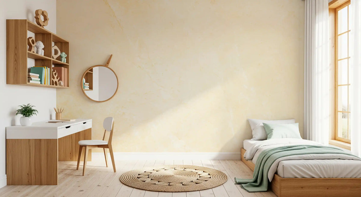 Kids room with single bed, mint throw and white desk on soft cream marble wallpaper GD14189