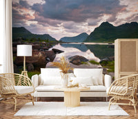Lake and mountain mural in living room with white sofa and rattan armchairs GD14192