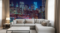 New York wallpaper mural behind a gray sectional, marble coffee table and curtains GD14205