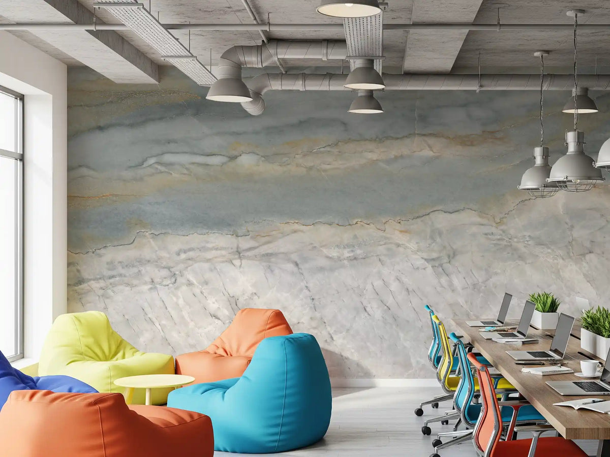 Marble wallpaper in an office with exposed ducts, colorful bean bags and desks GD14204