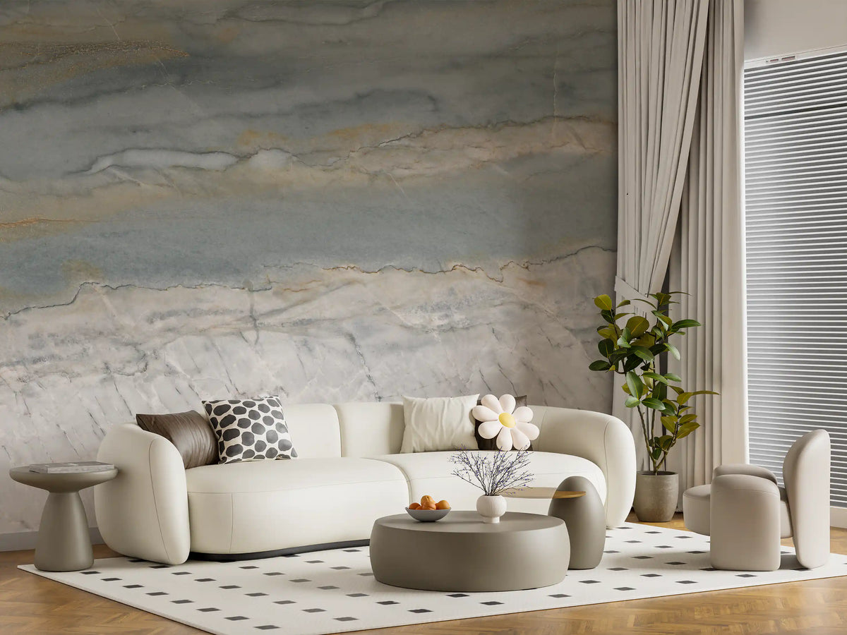 Cream curved sofa, round coffee table and tall curtains by a gray stone mural GD14204