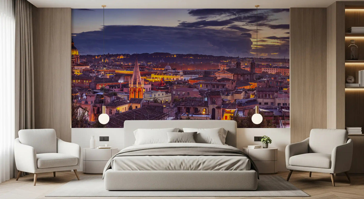 Bedroom with upholstered bed and two cream armchairs below a Roman dusk skyline GD14206