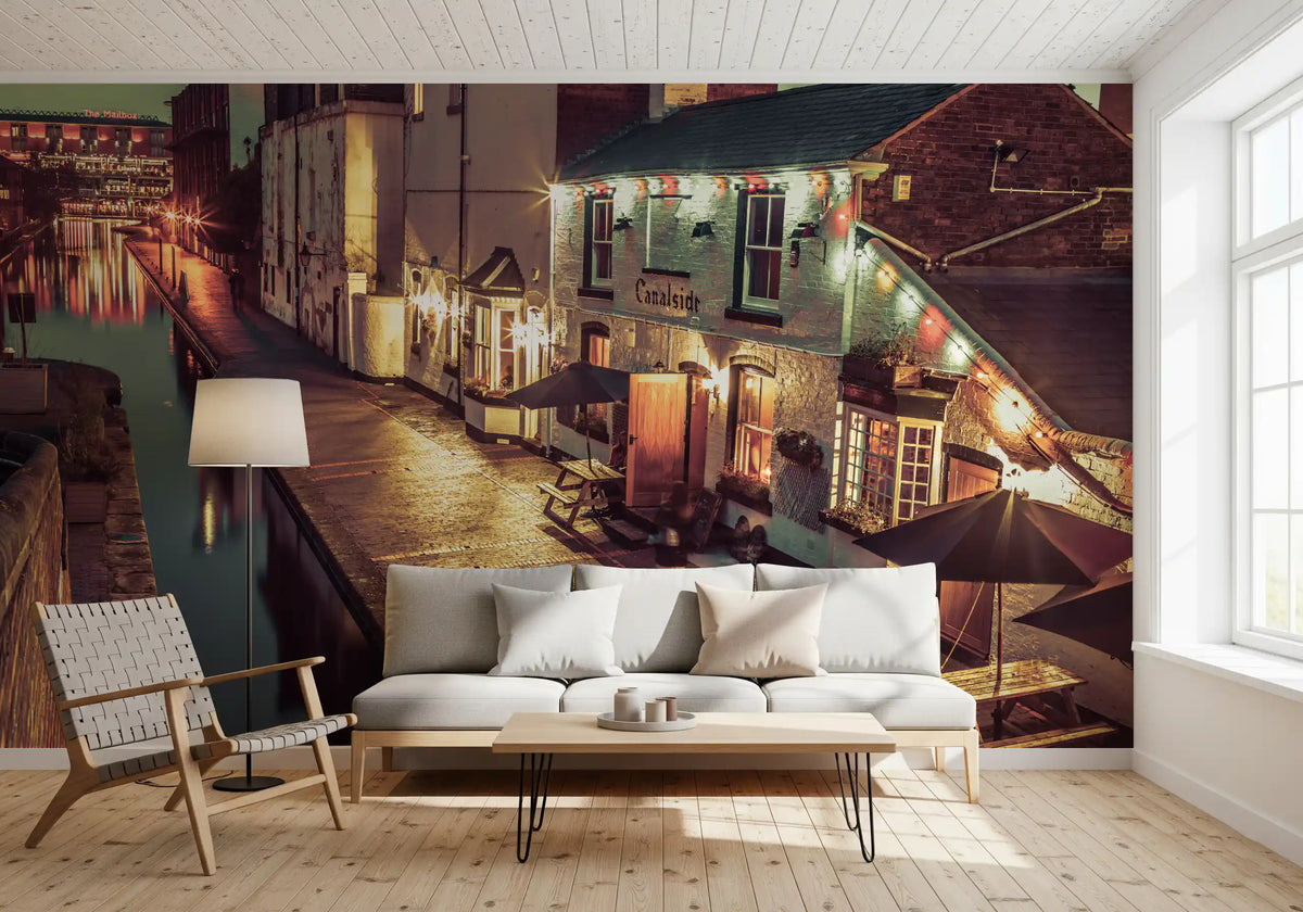 City wallpaper in a living room with cream sofa and woven wood armchair GD14208