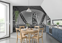 London wallpaper in a kitchen with round wood table and navy cabinets GD14209
