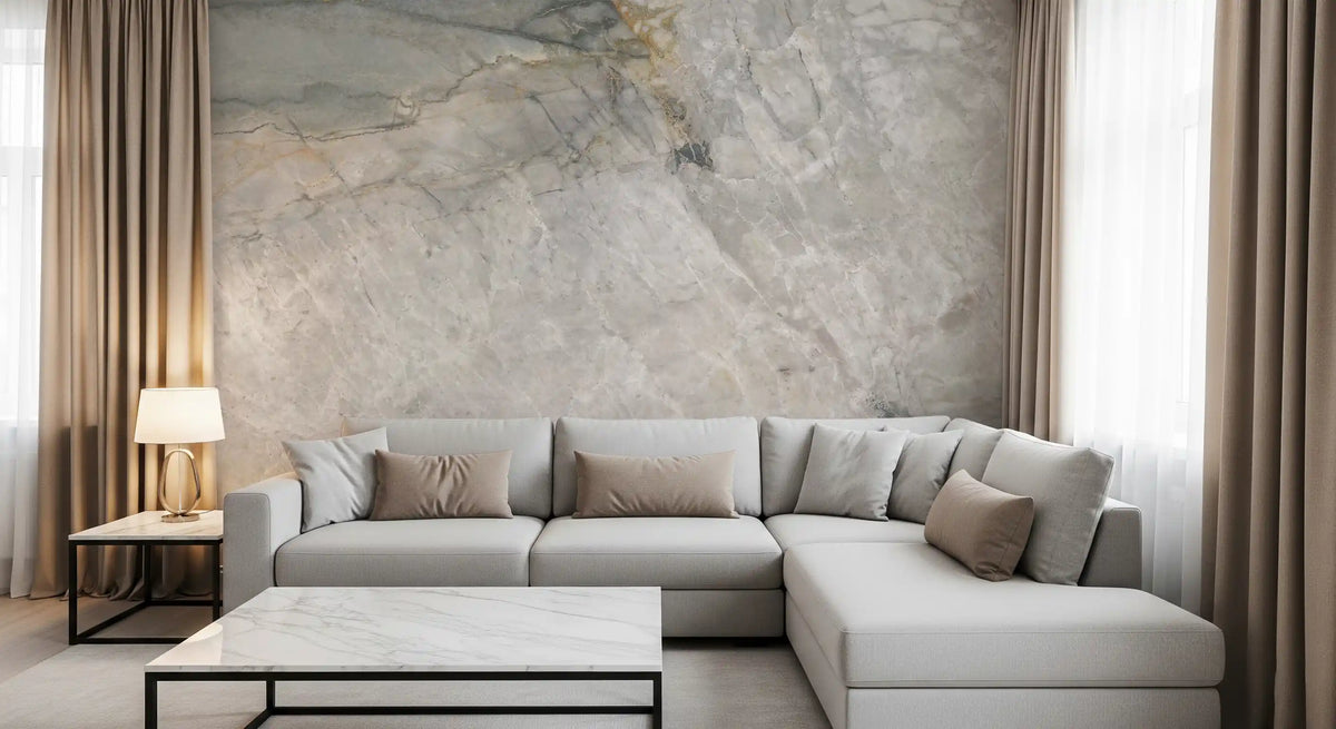 Gray marble mural behind a light gray sectional sofa and a white marble coffee table GD14211