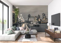 London wallpaper of the Thames at night behind a white sectional sofa and TV GD14214