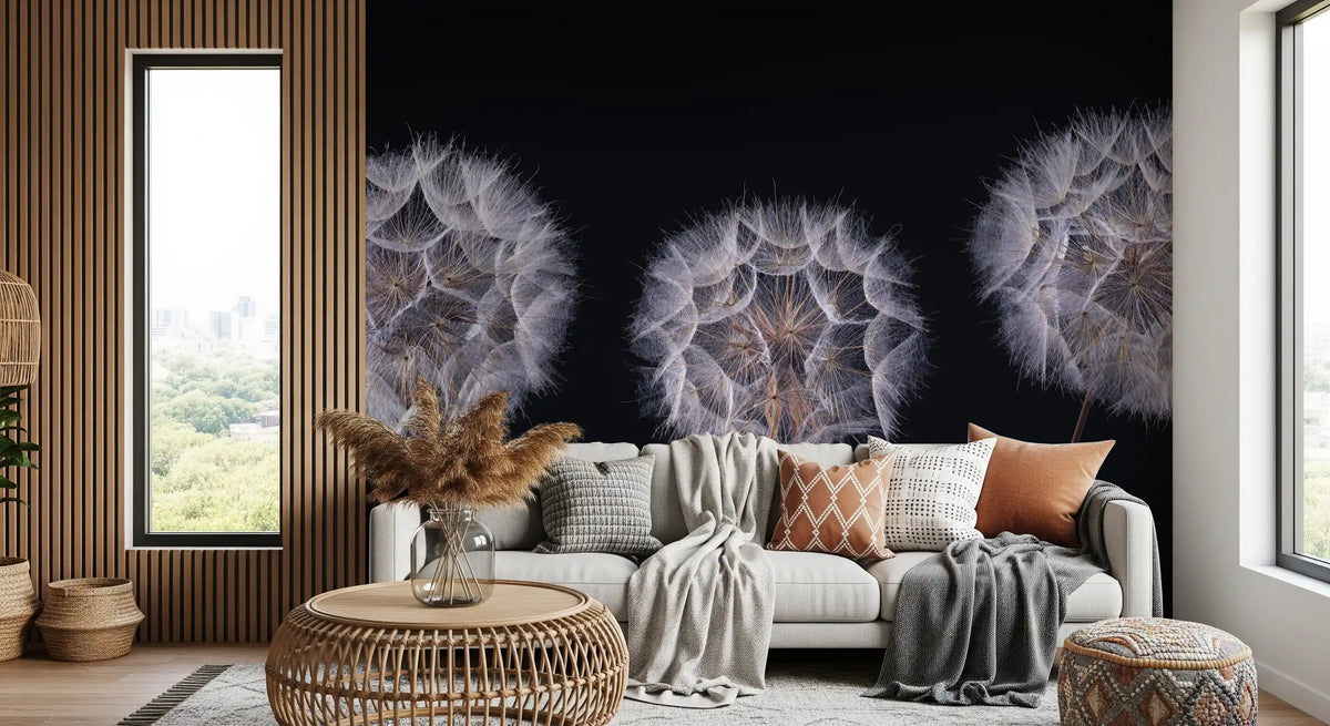 Gray sofa with orange cushions and rattan side table by a tall window on a seed head mural GD14218