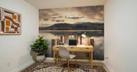 Home office with wooden desk, white chair and gold lamp on a tall lake jetty wall mural GD14220