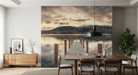 Dining room with dark wood table and black pendant lamp beside lake wallpaper GD14220