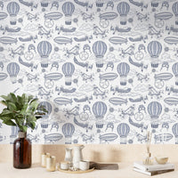 Aviation-themed wallpaper in soft sky-blue tones


