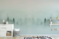 Dense forest wallpaper mural with a soft foggy atmosphere.
