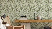 Spring scattered leaves wallpaper in light green tones

