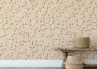 Neutral polka dot wallpaper with warm cream tones

