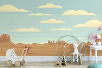Desert landscape kids mural with clouds and rings

